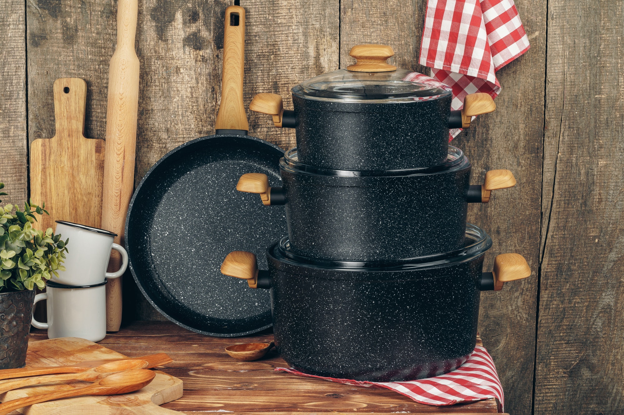 Set of cookware utensils on a kitchen counter